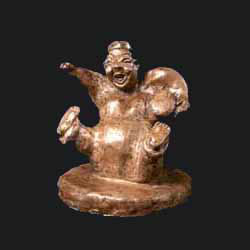 bronze sculpture of ancient drummer created by Carol Sakai entitled Yeah